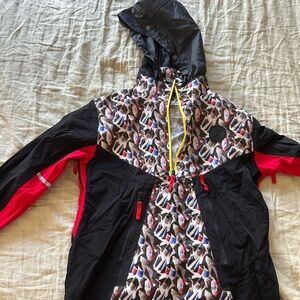 NWT Bauer Game 7 Raincoat with Geometric Pattern - Black and Red